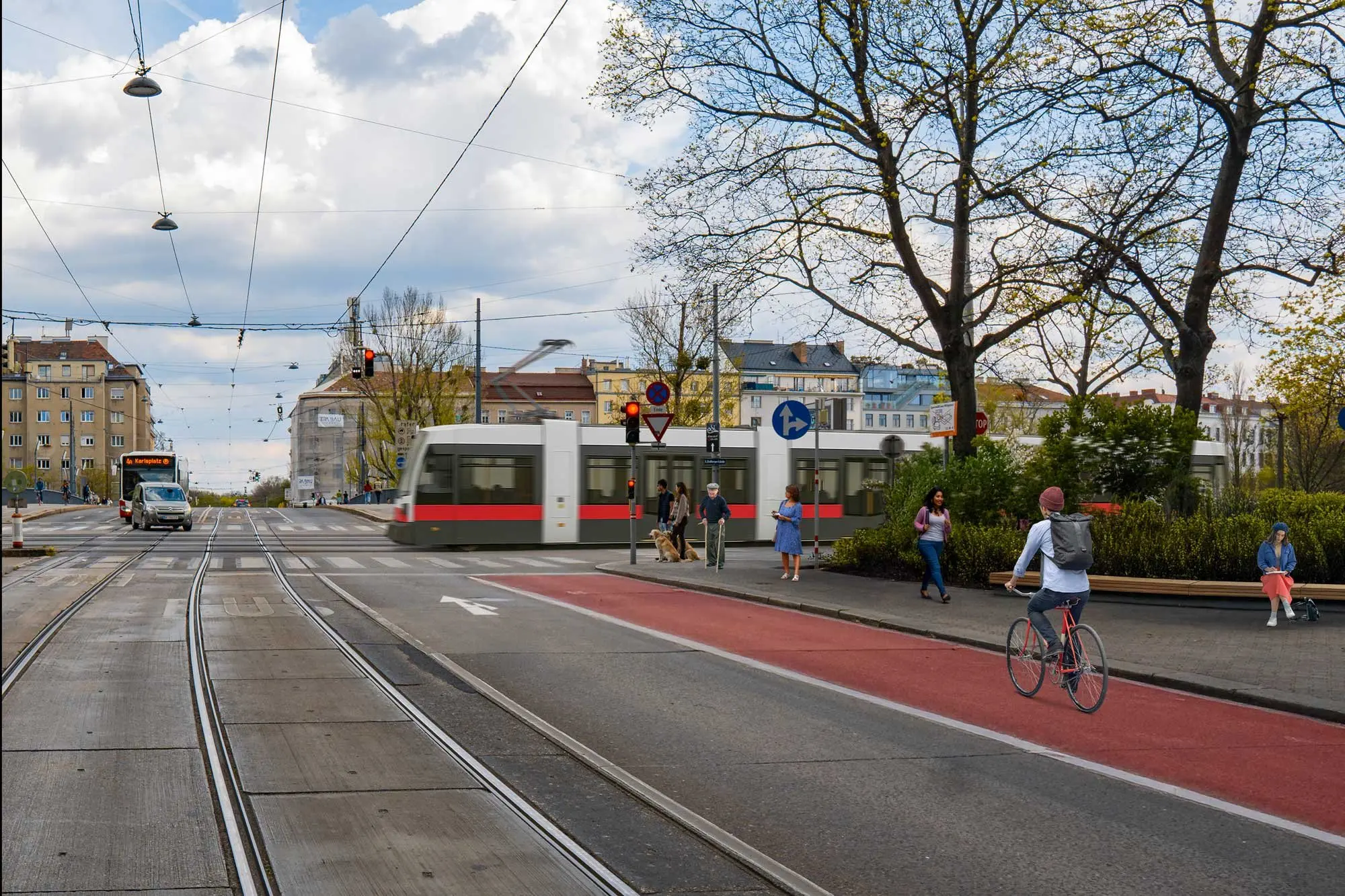 Straßen in Wien-Landstraße mit Bäumen, Radwegen, Sitzplätzen und Fußgänger:innen