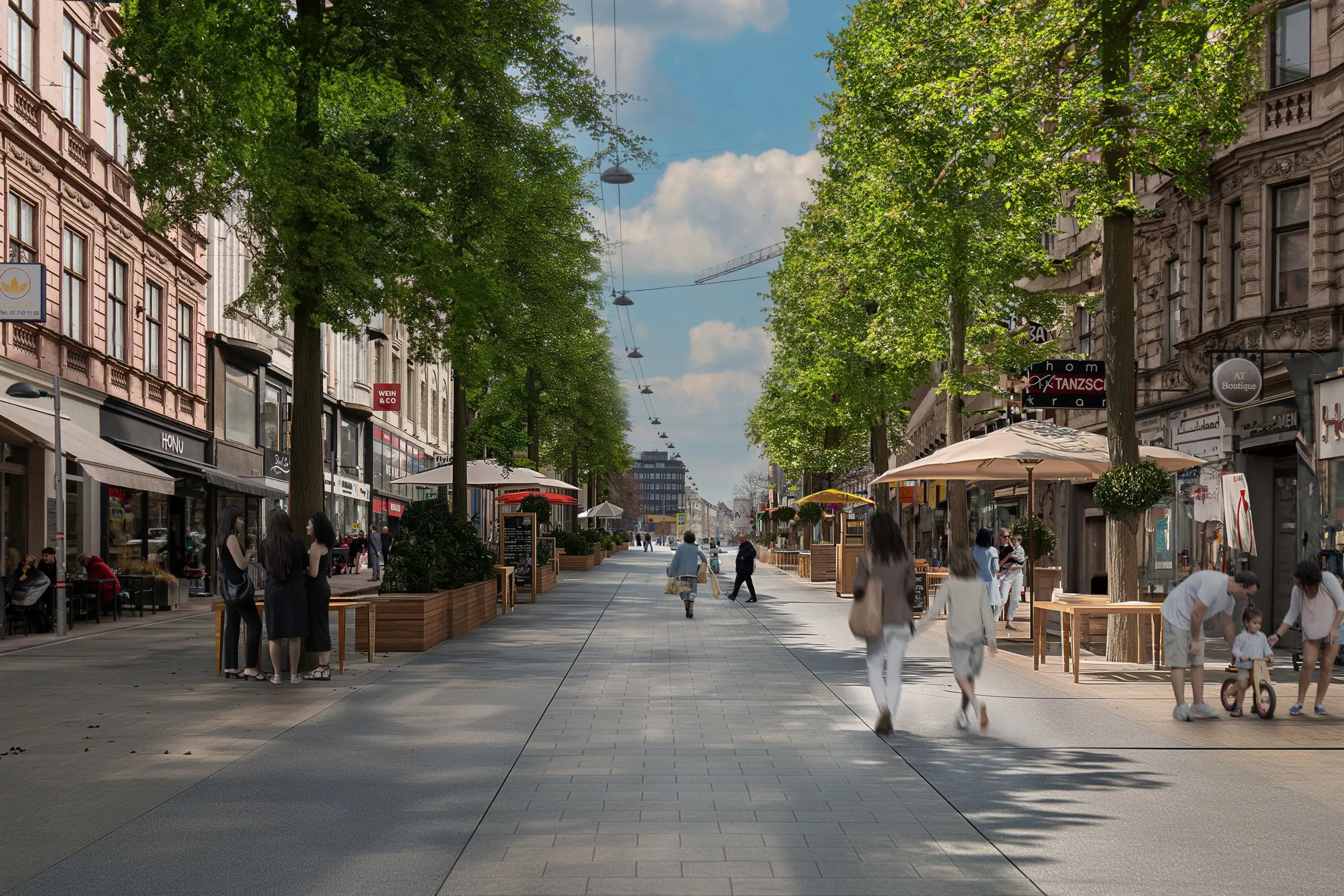 Straßen in Wien-Landstraße mit Bäumen, Radwegen, Sitzplätzen und Fußgänger:innen